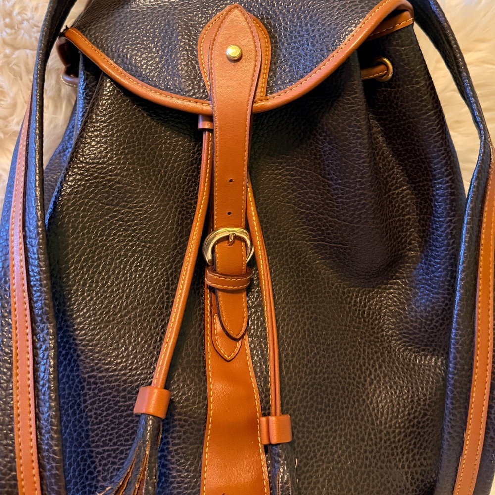 Authentic Dooney & Bourke Black and Tan Leather Backpack